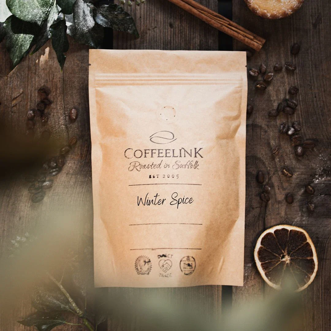 Natural kraft stock packaging pouch with an ink stamp