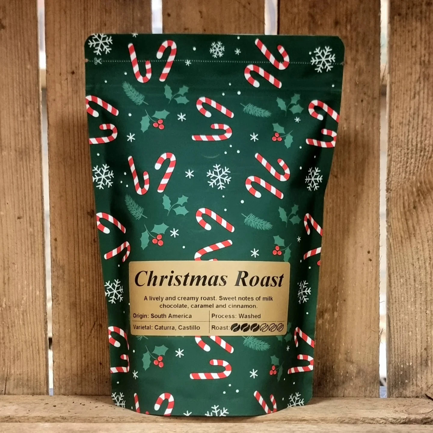 Green 250g Christmas stock packaging pouch with a sticker